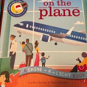 On the Airplane shine a light book